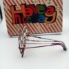 Colorful glasses beside a greeting card