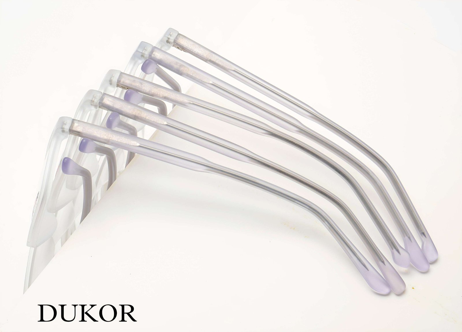 Various stylish eyeglasses displayed neatly with tr-90 frame, spring hinges