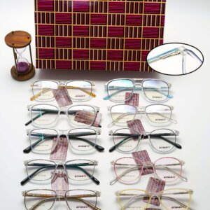 Various stylish eyeglasses displayed neatly with sheet frame, spring hinges
