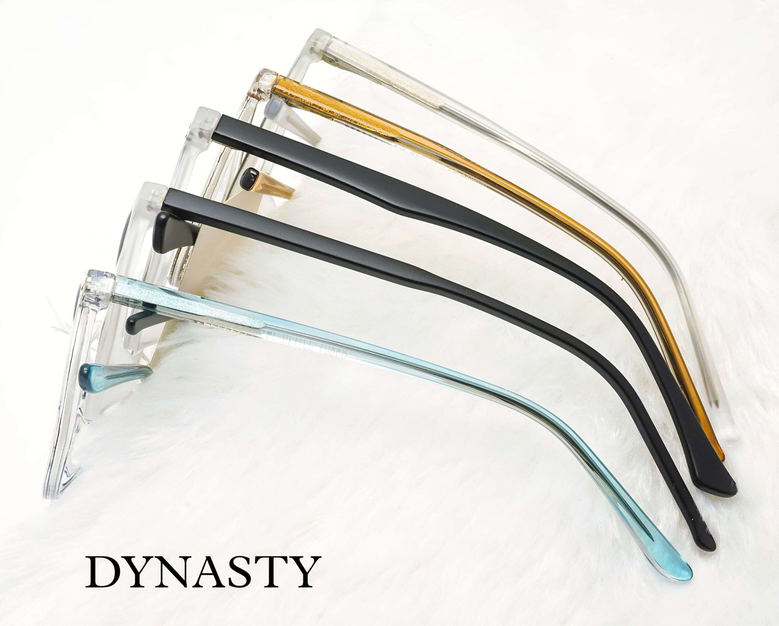 Various stylish eyeglasses displayed neatly with sheet frame, spring hinges