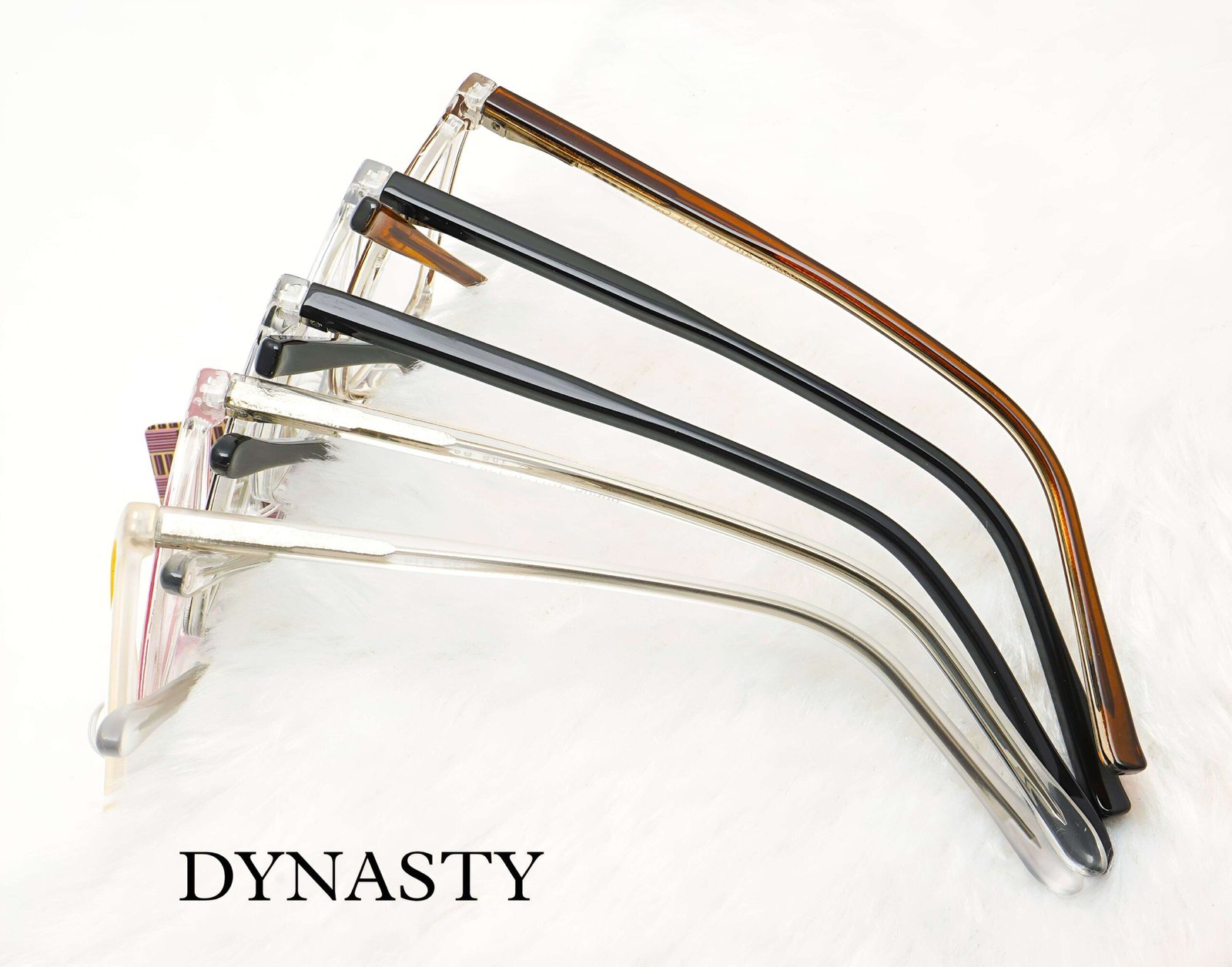 Various stylish eyeglasses displayed neatly with sheet frame, spring hinges