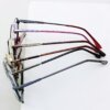 Various stylish eyeglasses displayed neatly with metal frame, spring hinges